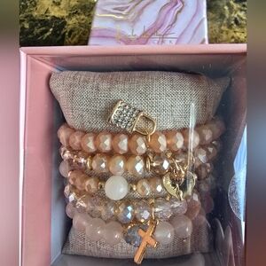 Nicole Miller Pink stretchy stacked boho bracelets